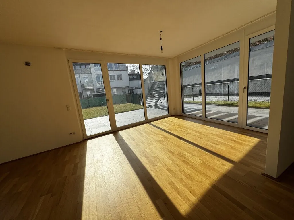 Schöne Familienwohnung mit Terrasse und großer Gartenfläche (T 1.3 / EG) - Ansicht 2