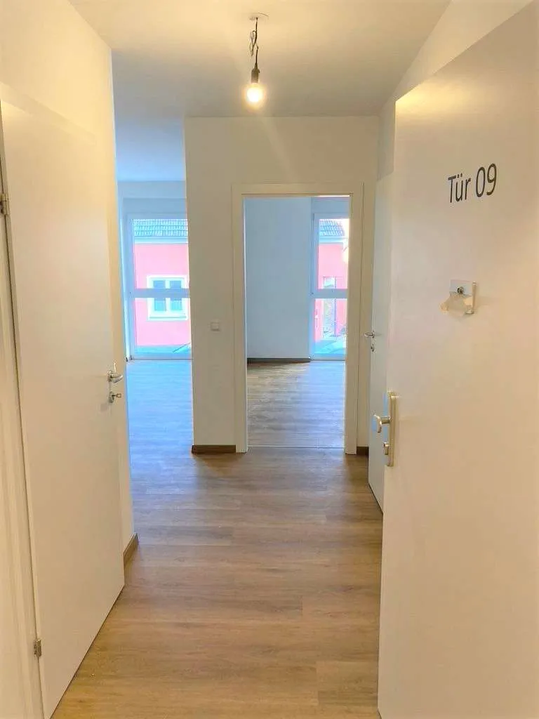 TIEFGARAGENSTELLPLATZ inklusive! ERSTBEZUGSQUALITÄT - Attraktive 2-Zimmer-Neubauwohnung in Zentrumslage - Ansicht 2