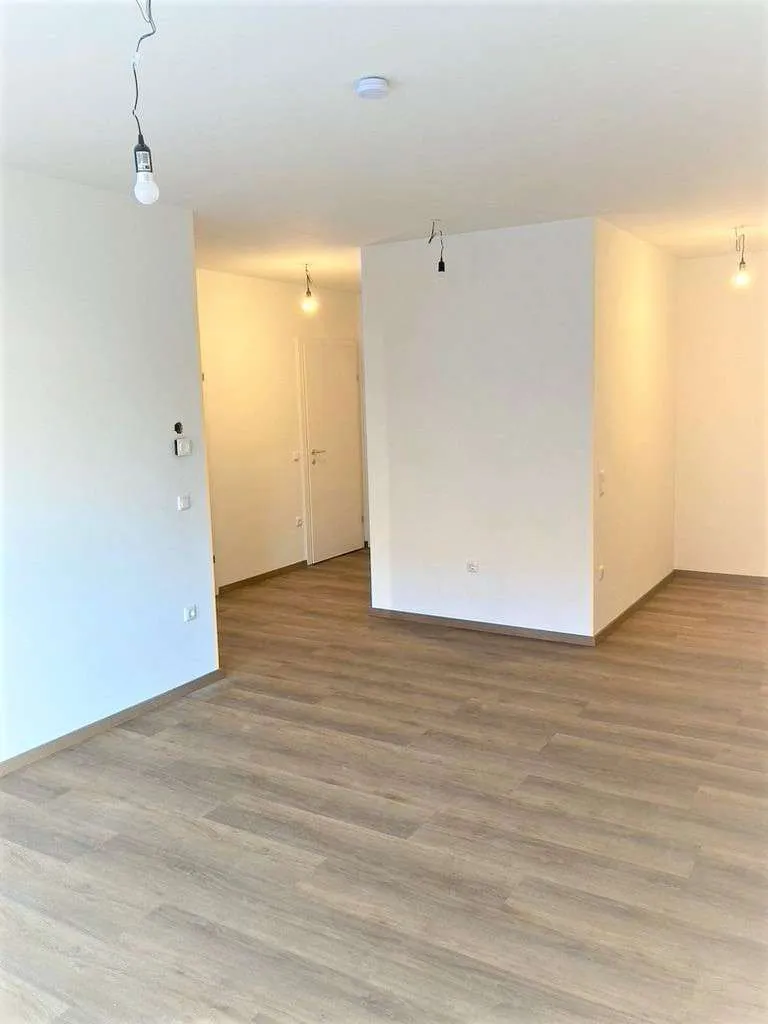 TIEFGARAGENSTELLPLATZ inklusive! ERSTBEZUGSQUALITÄT - Attraktive 2-Zimmer-Neubauwohnung in Zentrumslage - Ansicht 3