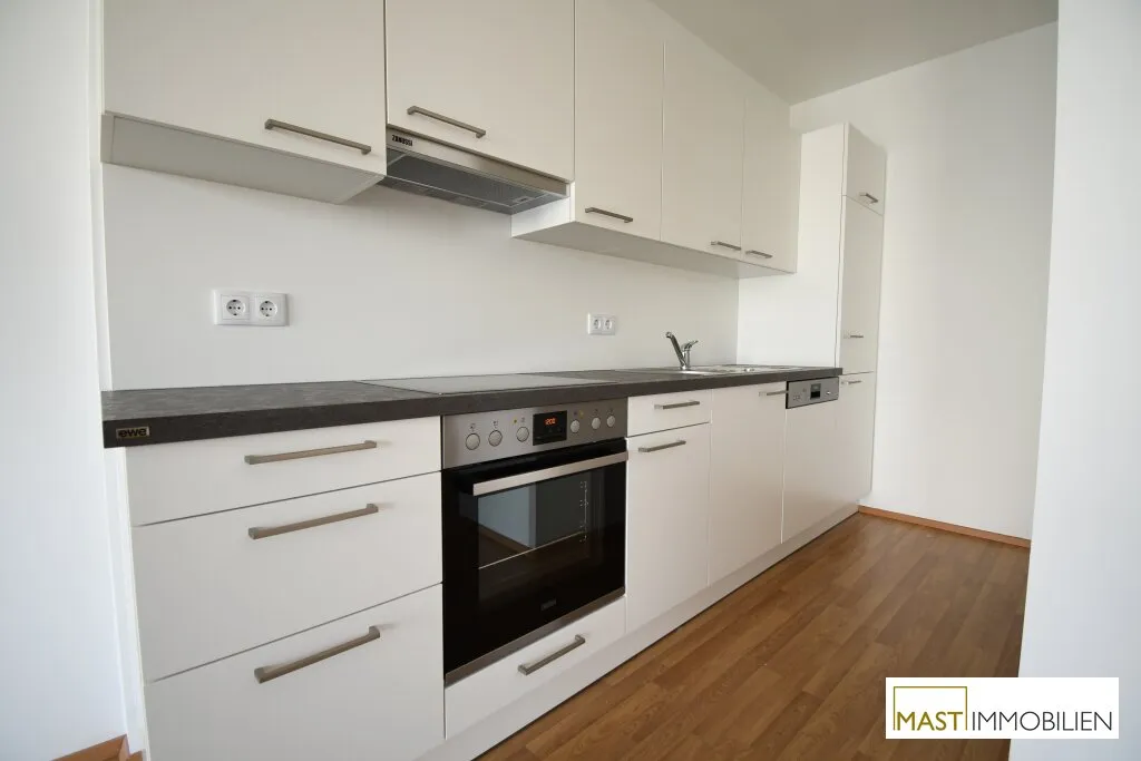 Ab 01.08.2026 verfügbar - 2 Zimmer Balkon Wohnung inkl. EWE Einbauküche direkt in Spillern - Neubau Bj. 2019 - Ansicht 3