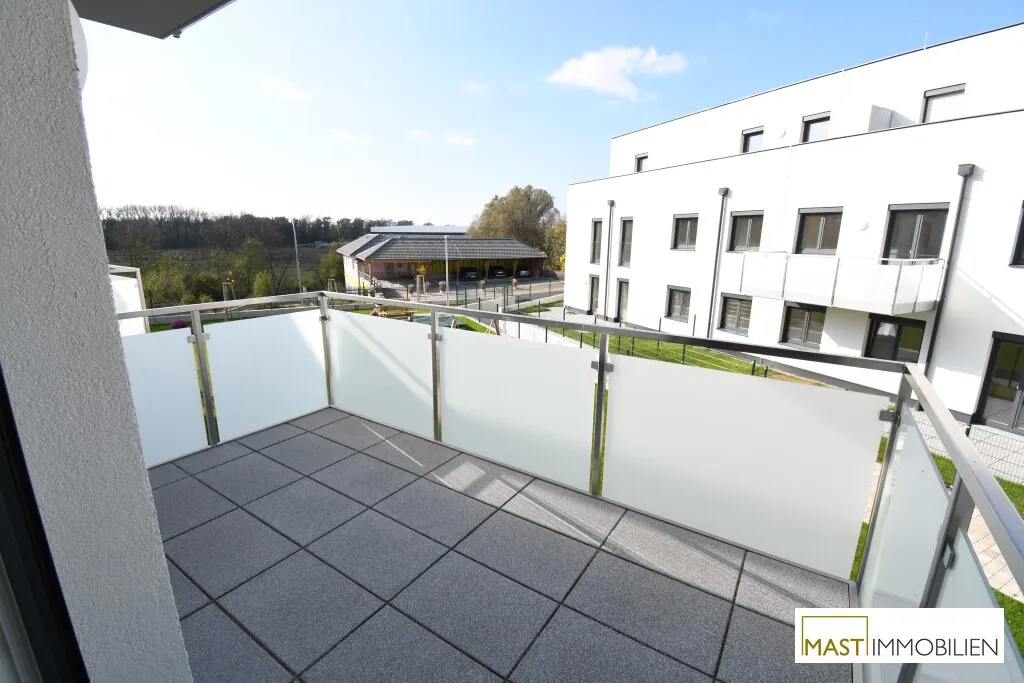Ab 01.08.2026 verfügbar - 2 Zimmer Balkon Wohnung inkl. EWE Einbauküche direkt in Spillern - Neubau Bj. 2019 - Ansicht 2