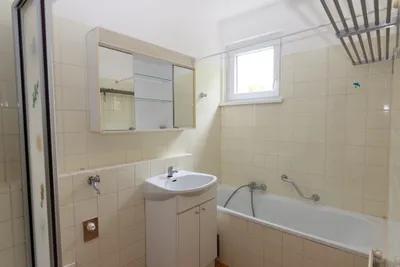 2-Zimmer-Wohnung kaufen in Baden – 82 m², € 210.000 – Bild 8 von 9