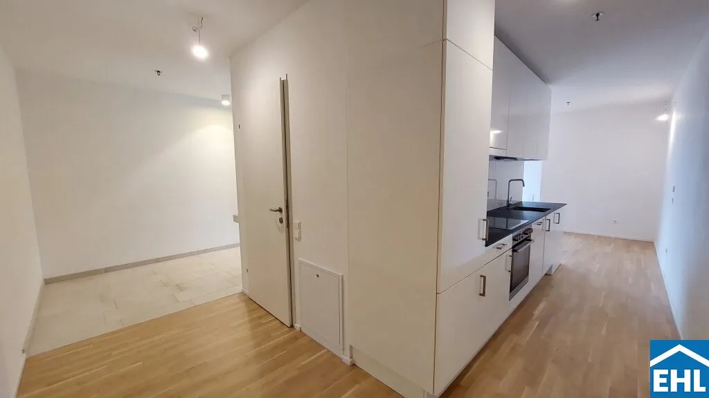 Sonnwendviertel: 1-Zimmer-Wohnung mit Balkon im 17. OG - Fitnessraum, Co-Working & Rooftop-Terrasse inklusive! - Ansicht 3
