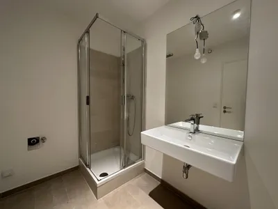 Neuwertige Erdgeschoßwohnung 23. Bezirk: Stilvoll, modern und komfortabel - mit Gemeinschaftsgarten und Tiefgarage – Bild 3