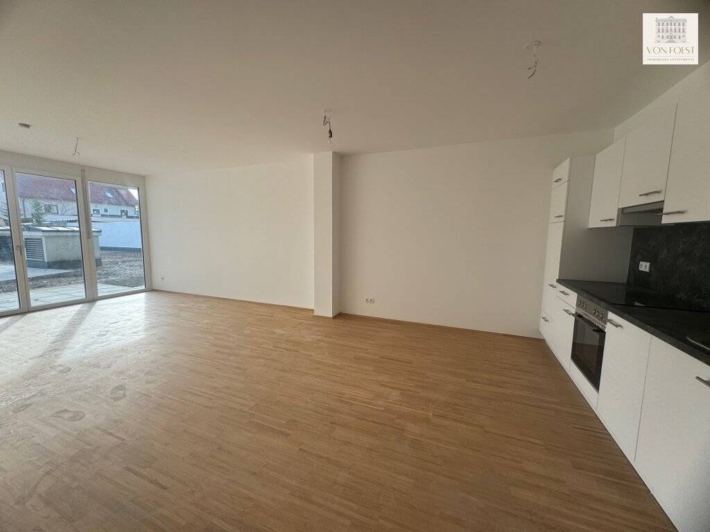 SMARTE Garten-Wohnung I 2-Zimmer I Echtholzparkett I Tischlerküche I ANLAGE-WOHNUNG im ZENTRUM von Leobersdorf - Ansicht 2