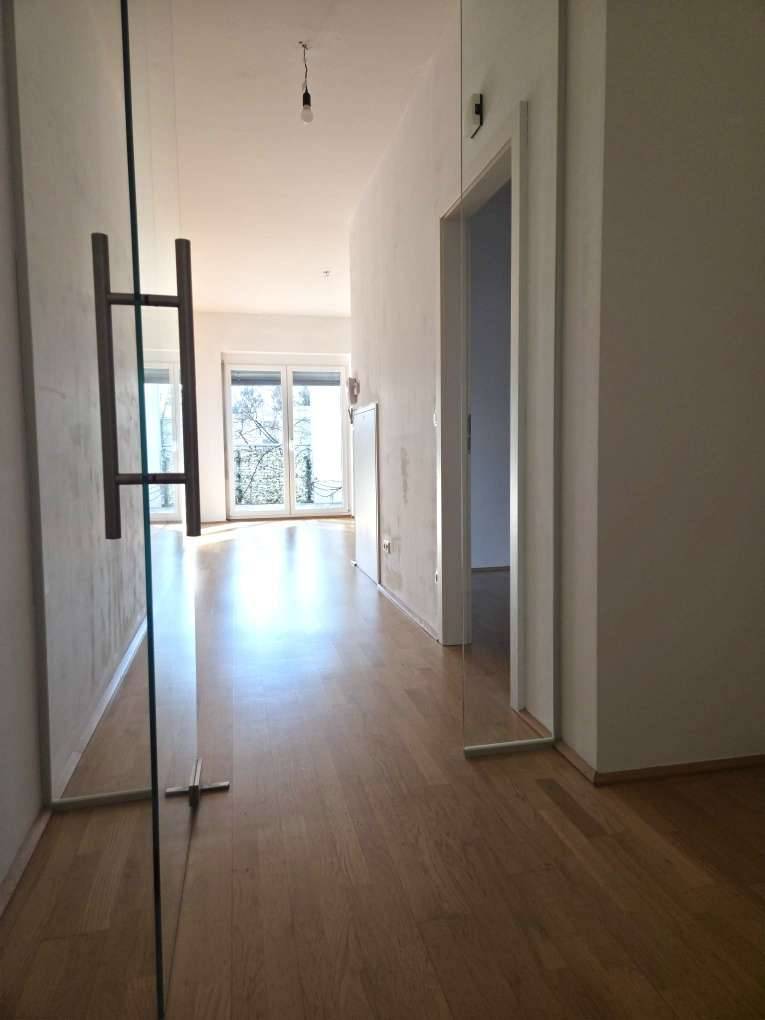 Modern Wohnen im Grünen - Eigentumswohnung in fast neuem Haus - Ansicht 2