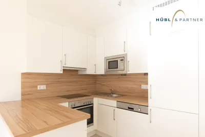2-Zimmer-Wohnung mit Küche und Loggia | Panorama-Pool, Dachterrasse & Sauna – Bild 3