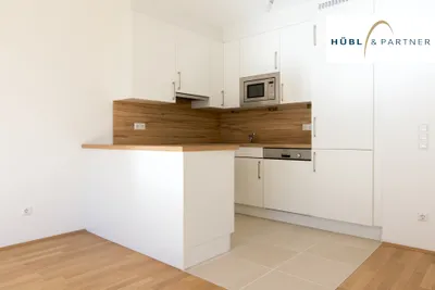 2-Zimmer-Wohnung mit Küche und Loggia | Panorama-Pool, Dachterrasse & Sauna – Bild 2