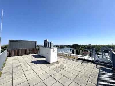 Penthouse mit Donaublick und 360 Grad Dachterrasse - direkt an der Alten Dona