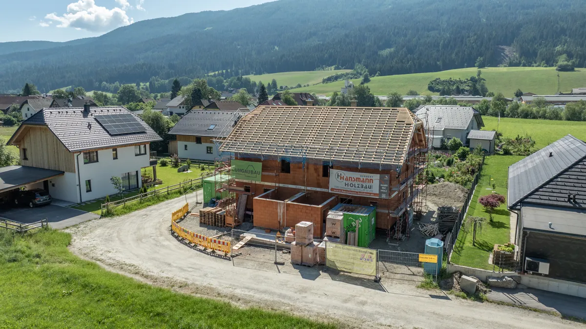 Neubau-Doppelhaushälfte mit Süd-Garten und Carport - Ansicht 3
