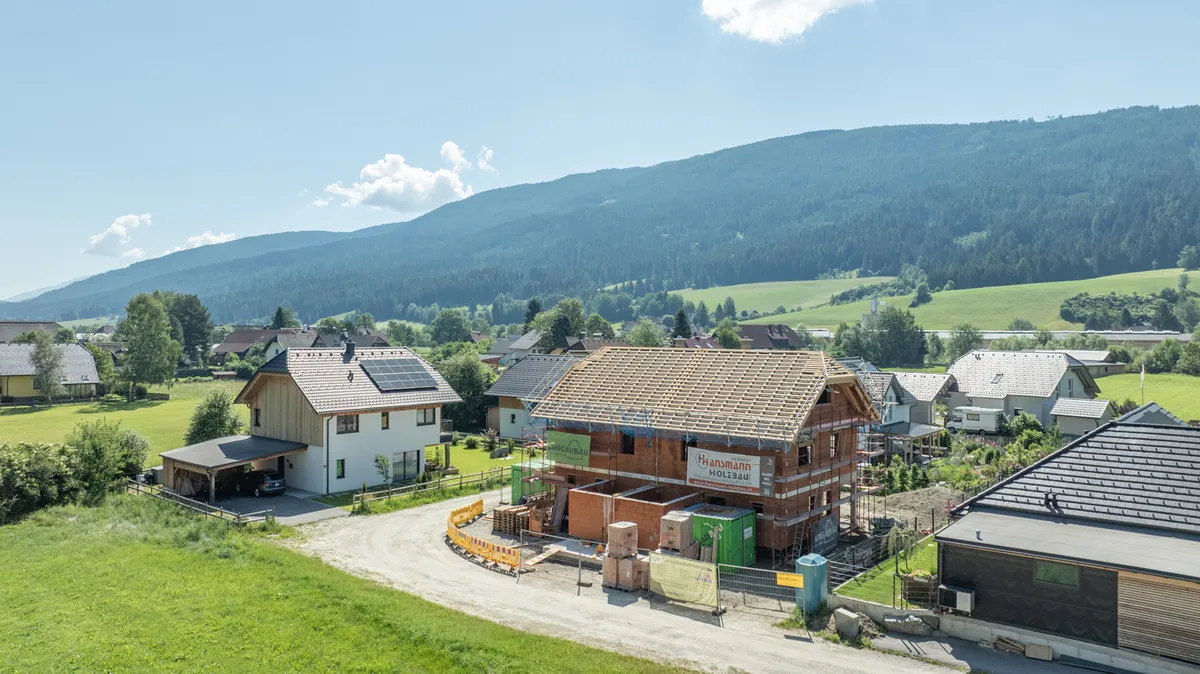 Neubau-Doppelhaushälfte mit Süd-Garten und Carport - Ansicht 2