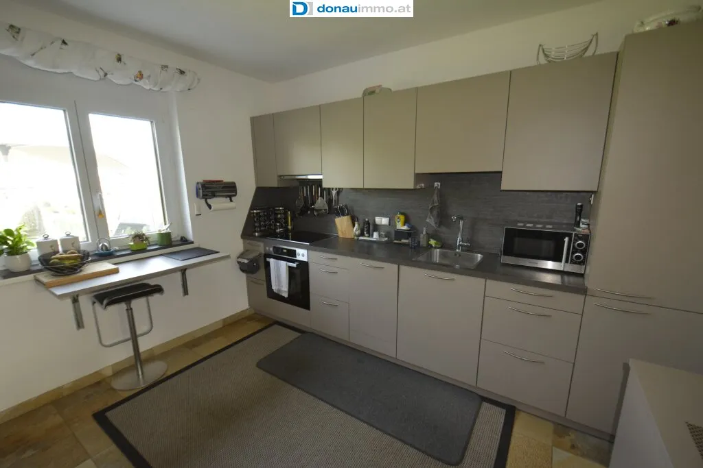 Geschmackvoll modernisiertes 4-Zimmer-Haus in Rohrendorf mit Schwimmteich und Garage samt Carport - Ansicht 2
