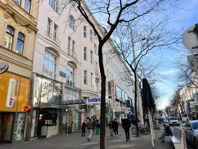 Elegante Altbauwohnung in urbaner Toplage – Bild 2