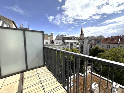 Moderne Dachgeschosswohnung mit Terrasse – Bild 2