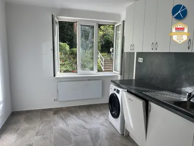 Wohnküche mit Gartenblick + Zimmer
