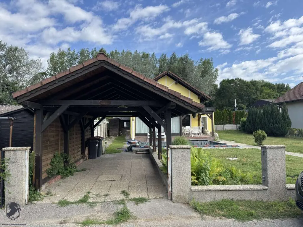 Charmantes Einfamilienhaus mit Pool & Wintergarten in ruhiger Donau-Lage - Ansicht 3