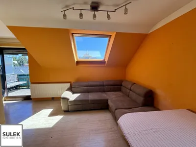 Perfekt geschnittene DG-Single-Neubauwohnung mit Terrasse in Wien Mauer – Bild 2