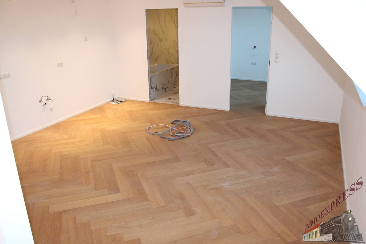 Exklusive Dachgeschosswohnung im 9. Bezirk mit Balkon und Terrasse - Ansicht 3