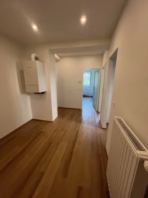 Moderne Stadtwohnung in ruhiger Lage mit Garten in 1140 Wien zu vermieten! – Bild 2