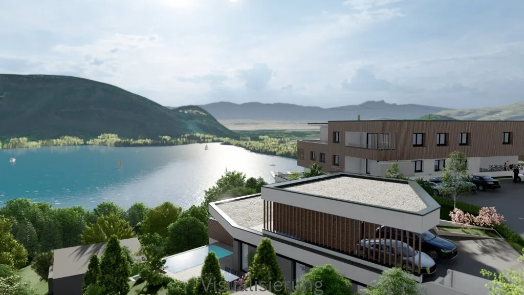 IHR EXKLUSIVER RÜCKZUGSORT AM OSSIACHER SEE! SENSATIONELLES BAUGRUNDSTÜCK INKLUSIVE EINEM BEWILLIGTEN EINFAMILIENWOHNHAUS MIT UNBESCHREIBLICHEM SEE-, BERG- UND WEITBLICK! - Ansicht 2