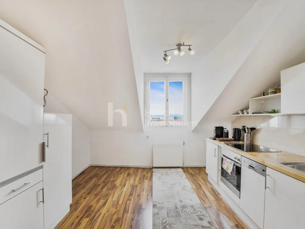 Großzügige Dachgeschosswohnung mit 3 Zimmern in gepflegtem Altbau - Ansicht 3