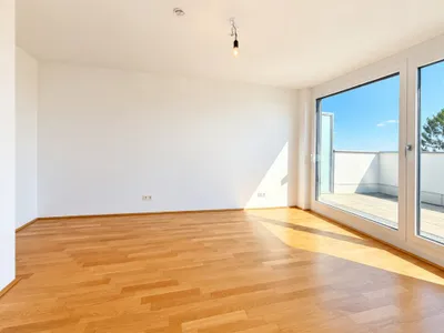 Exklusive Dachgeschosswohnung mit spektakulärem Donau- & Stadtblick – Bild 2