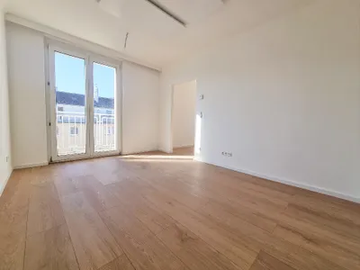 Erstbezug nach Sanierung: Moderne 2-Zimmer-Wohnung mit großer Dachterrasse in 1120 Wien