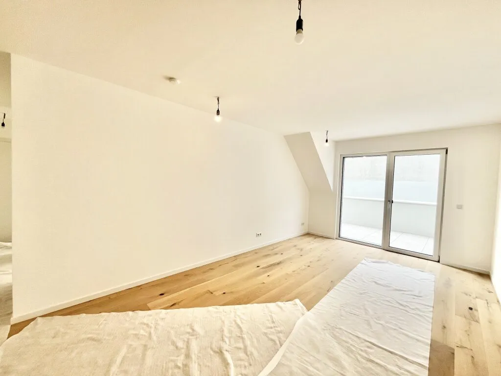Charmante 3-Zi Dachgeschosswohnung mit Balkon, Garage & U-Bahn Nähe in 1230 Wien! - Ansicht 3