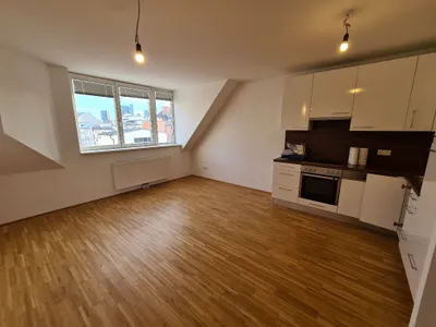 Wunderbare Dachgeschoss-Maisonette mit Terrasse - nahe zum Bahnhof Meidling! – Bild 2