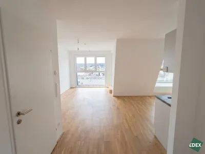 Helle 2-Zimmer-Dachgeschosswohnung mit großer Terrasse & Grünblick – Bild 2