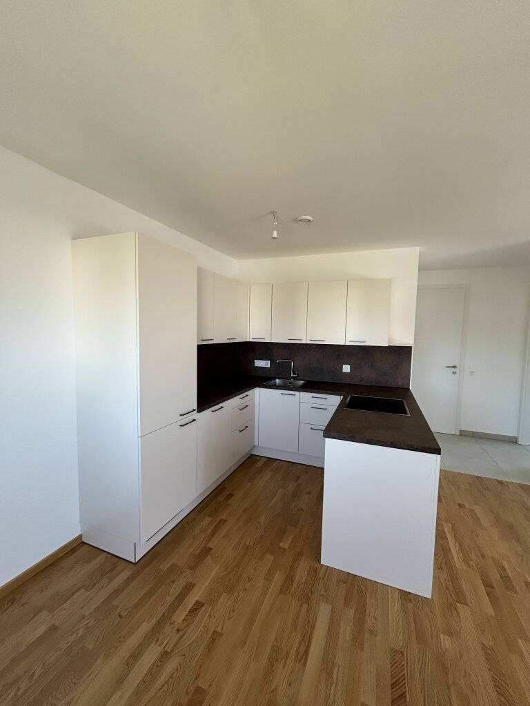 Neu errichtete helle 2 Zimmer Dachgeschoßwohnung mit Balkon und Garagenplatz - ERSTBEZUG - Ansicht 2