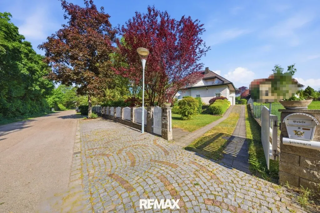 Hochkarätiges Wohnen in begehrter Lage - viel Platz, tolle Architektur und optimale Raumaufteilung! - Ansicht 3