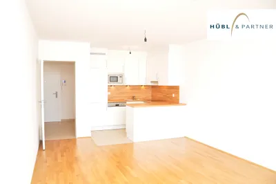 2 ZIMMER-WOHNUNG mit Balkon, Panoramapool, Fitnessraum und Sonnendeck/Dachterrasse am Kirschblütenpark – Bild 3
