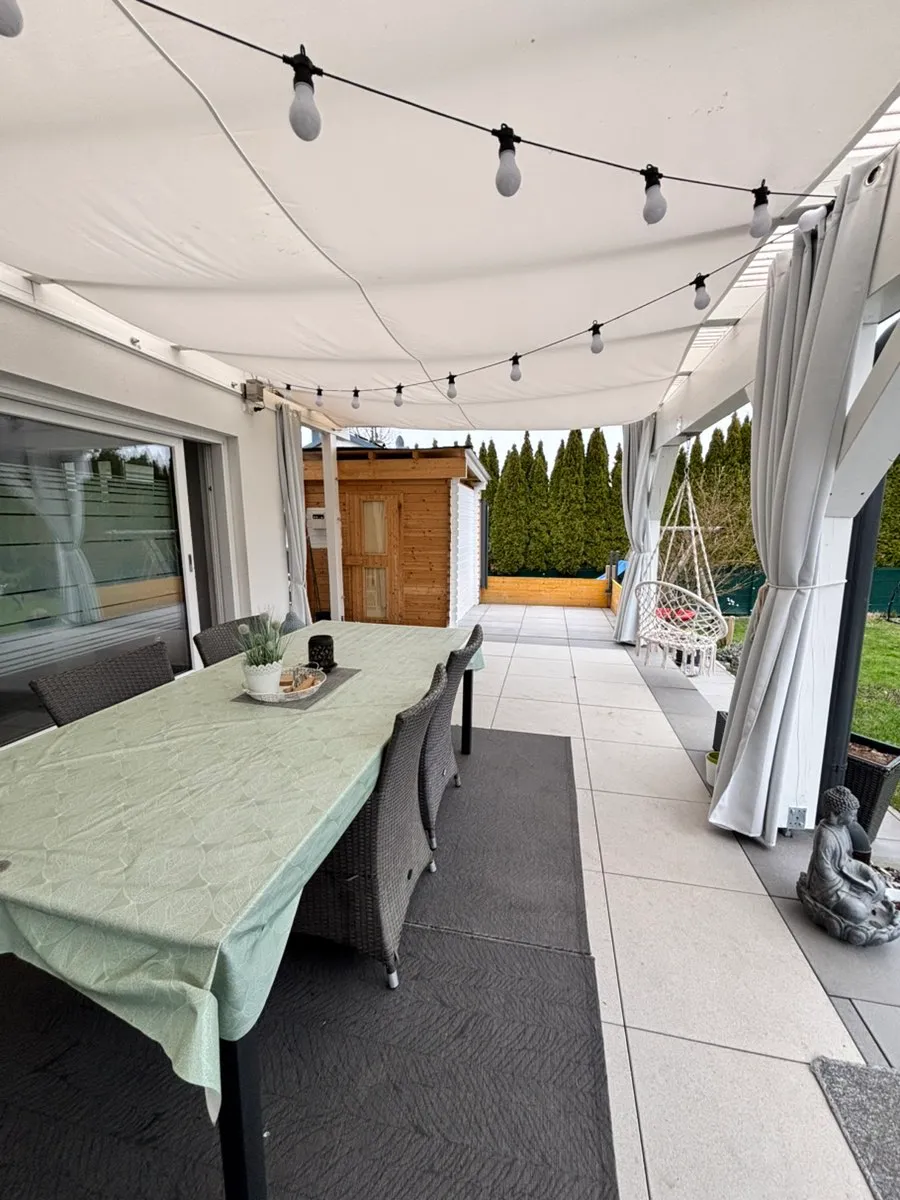 Modernisiertes Einfamilienhaus mit großem Grundstück, Keller, großzügig überdachter Terrasse, Sauna & Doppelcarport in Braunau/ Haselbach - Ansicht 2