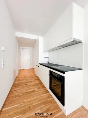Modernes Single-Apartment nahe UNO City mit Loggia – Bild 3