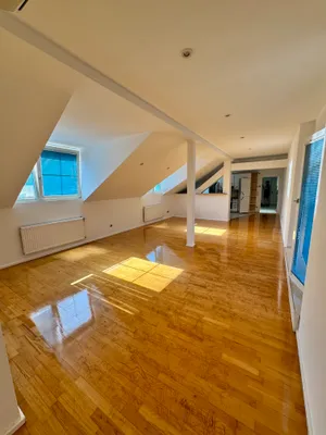 Exclusive, großzügige Dachgeschosswohnung mit Terrasse & Loggia in 1220 Wien – Bild 2