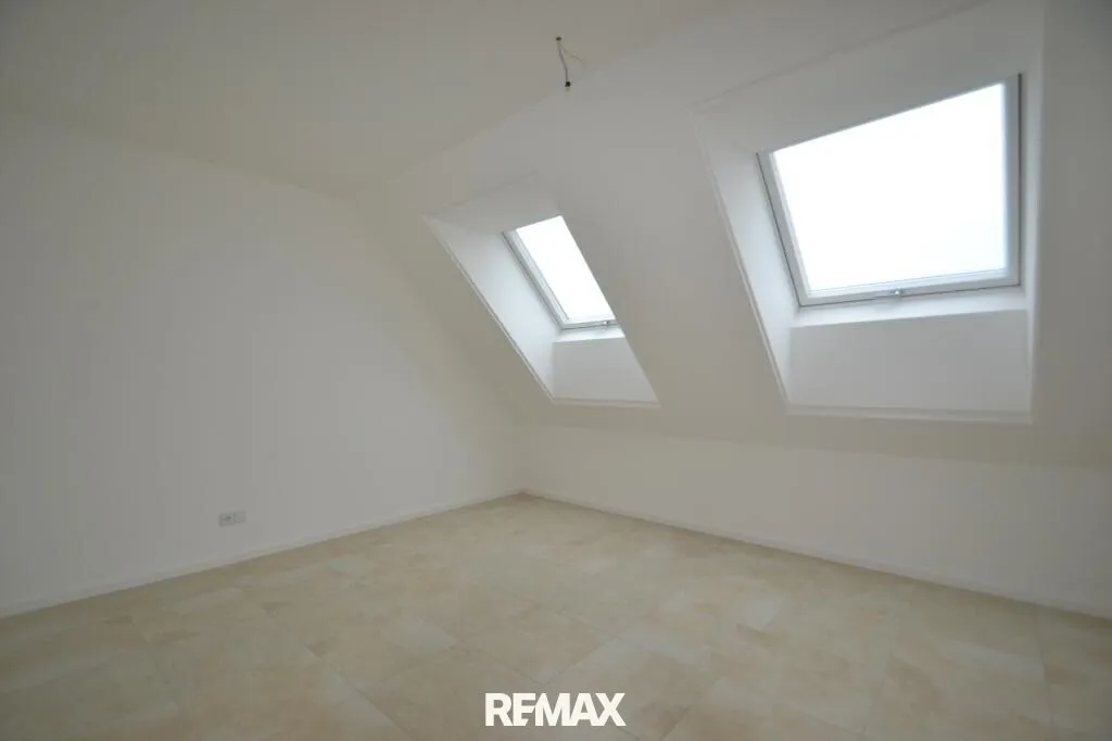 Moderne und große Wohnung mit Dachterrasse und Carportstellplatz - Ansicht 3