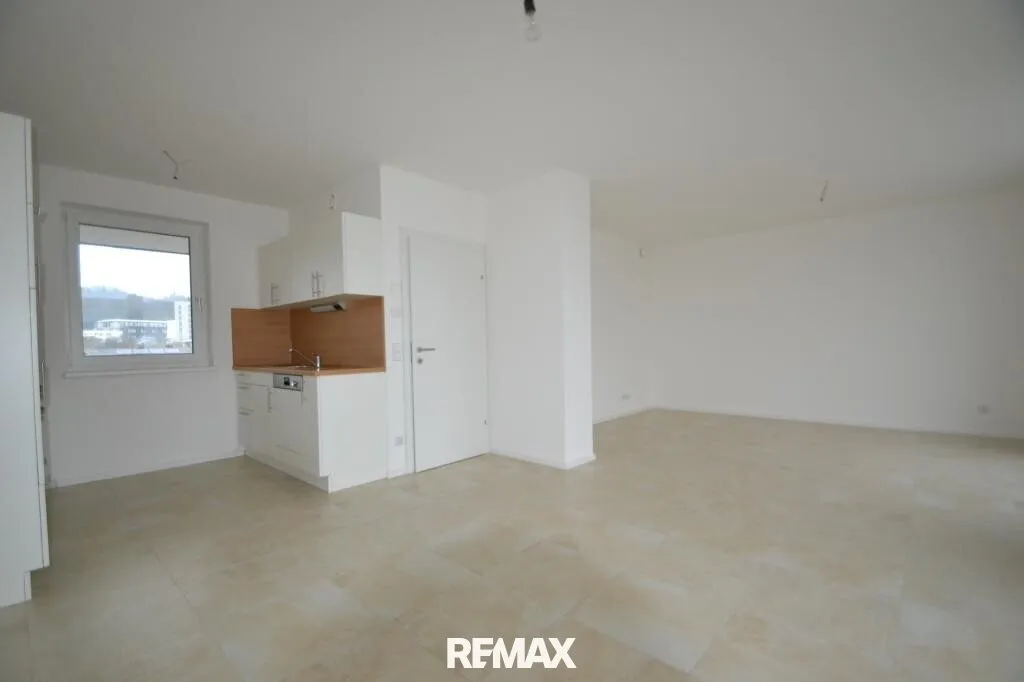 Moderne und große Wohnung mit Dachterrasse und Carportstellplatz - Ansicht 2
