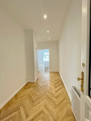 Stilvolle Luxus-Altbauwohnung im 7. Bezirk – Bild 2