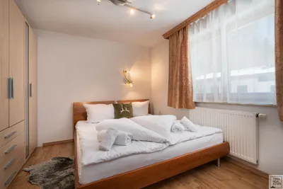 10-Zimmer-Immobilie kaufen in Kitzbühel – 221 m², € 1.690.000 – Bild 7 von 23