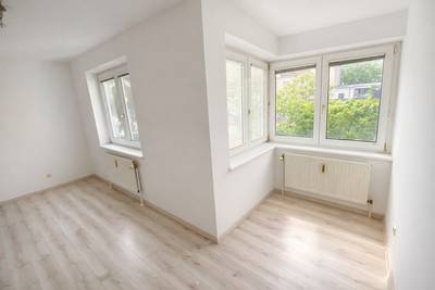 Ruhige 2-Zimmer-Wohnung mit Gartenmitbenutzung und Tiefgaragenplatz – Bild 2