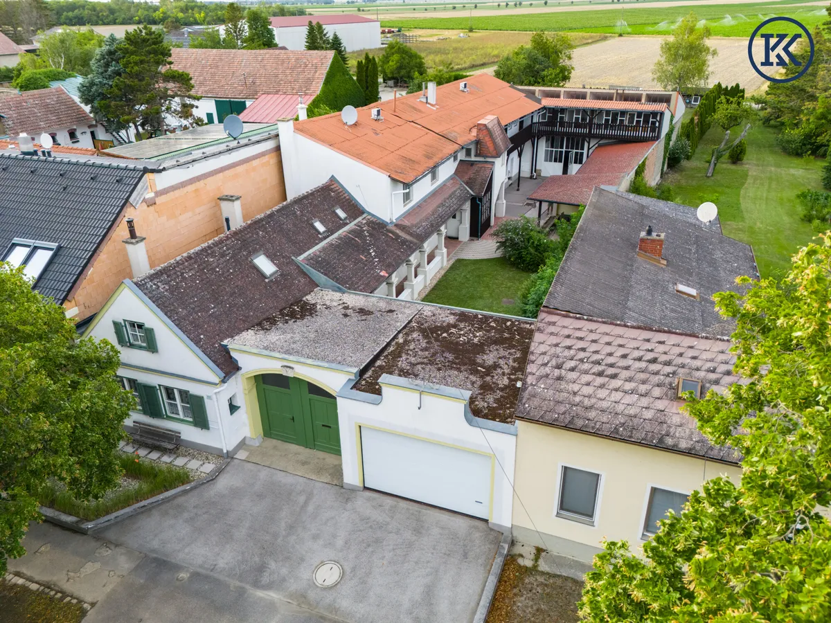 Großzügige Immobilien für ruhiges Wohnen und Gewerbe - Große Lagerhalle + Garten - Ansicht 2