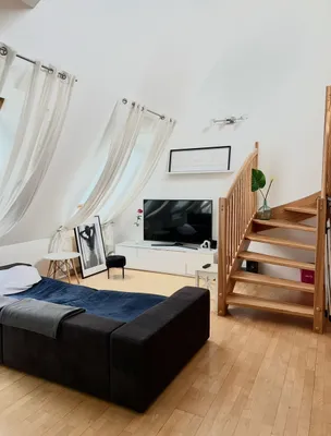 Helle Dachgeschoss-Maisonette mit 30 m² Dachterrasse