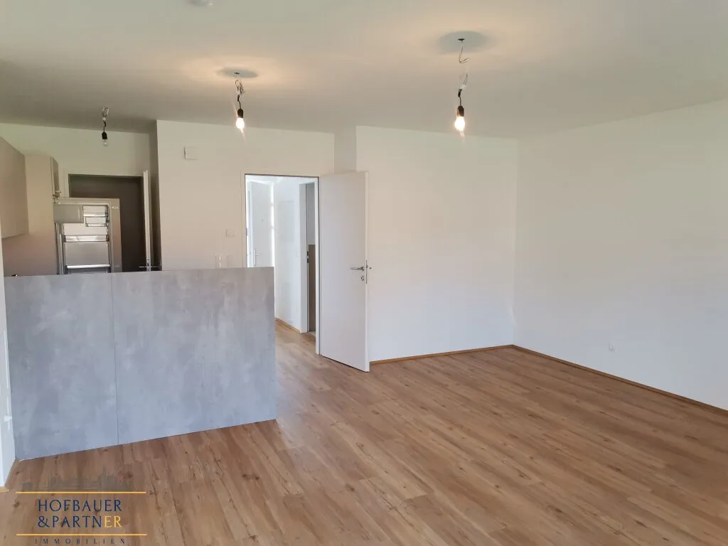 Erstbezug - 1-Zimmer-Gartenwohnung mit PKW-Abstellplatz - Ansicht 2