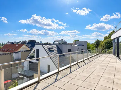 Exklusive 3-Zimmer-Dachgeschosswohnung mit großzügiger Terrasse & Weitblick – Bild 2