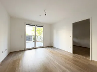 Moderne 2-Zimmer-Wohnung mit kleinem Garten und Kühlung! – Bild 3