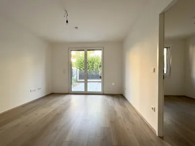 Moderne 2-Zimmer-Wohnung mit kleinem Garten und Kühlung! – Bild 2