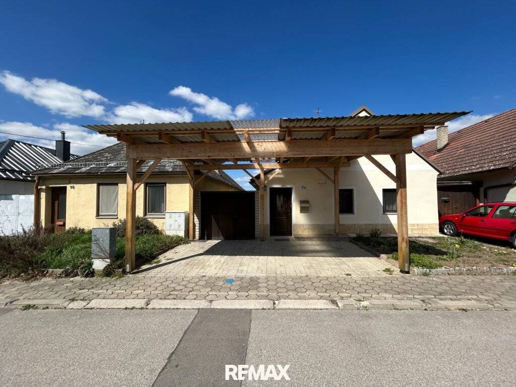 Gemütliches Einfamilienhaus mit Carport & Garten auf ca. 302 m² Grundstück - Ansicht 2