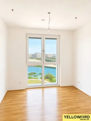 3-Zimmer-Neubauwohnung mit großzügiger TERRASSE, überdachtem BALKON und Blick über Seestadt – Bild 3