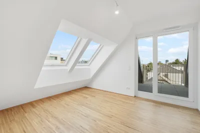 Moderne Erstbezug-Mietwohnungen mit privaten Freiflächen und Garage im 21. Bezirk